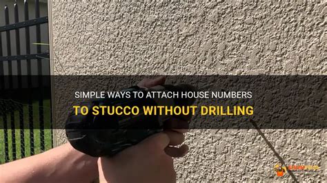 attaching metal numbers to stucco exterior